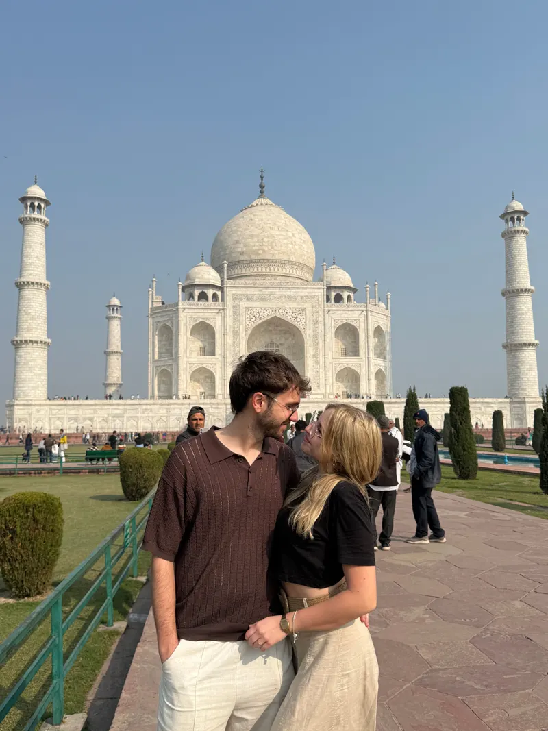 Standing in front of the Taj Mahal