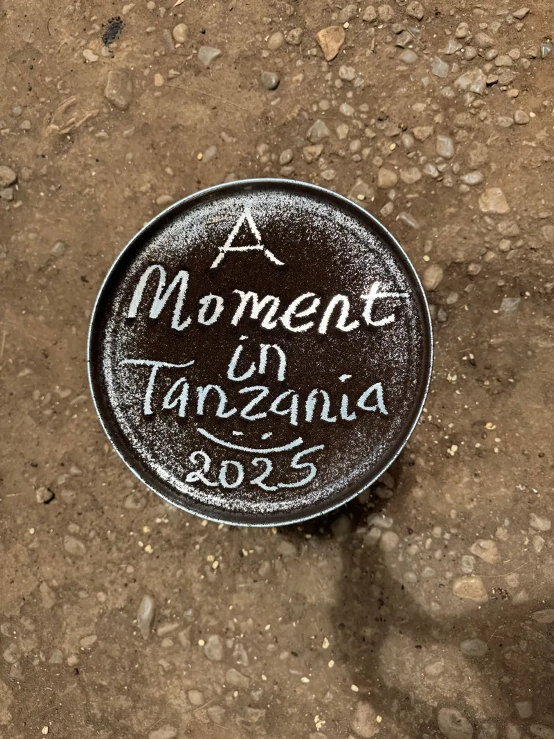 A Moment in Tanzania 2025 written with ground coffee