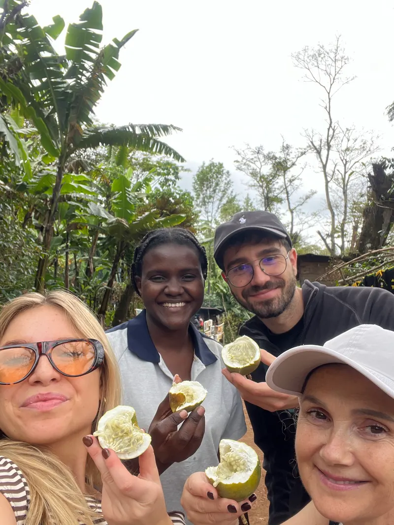 Selfie with our guide holding passion fruit
