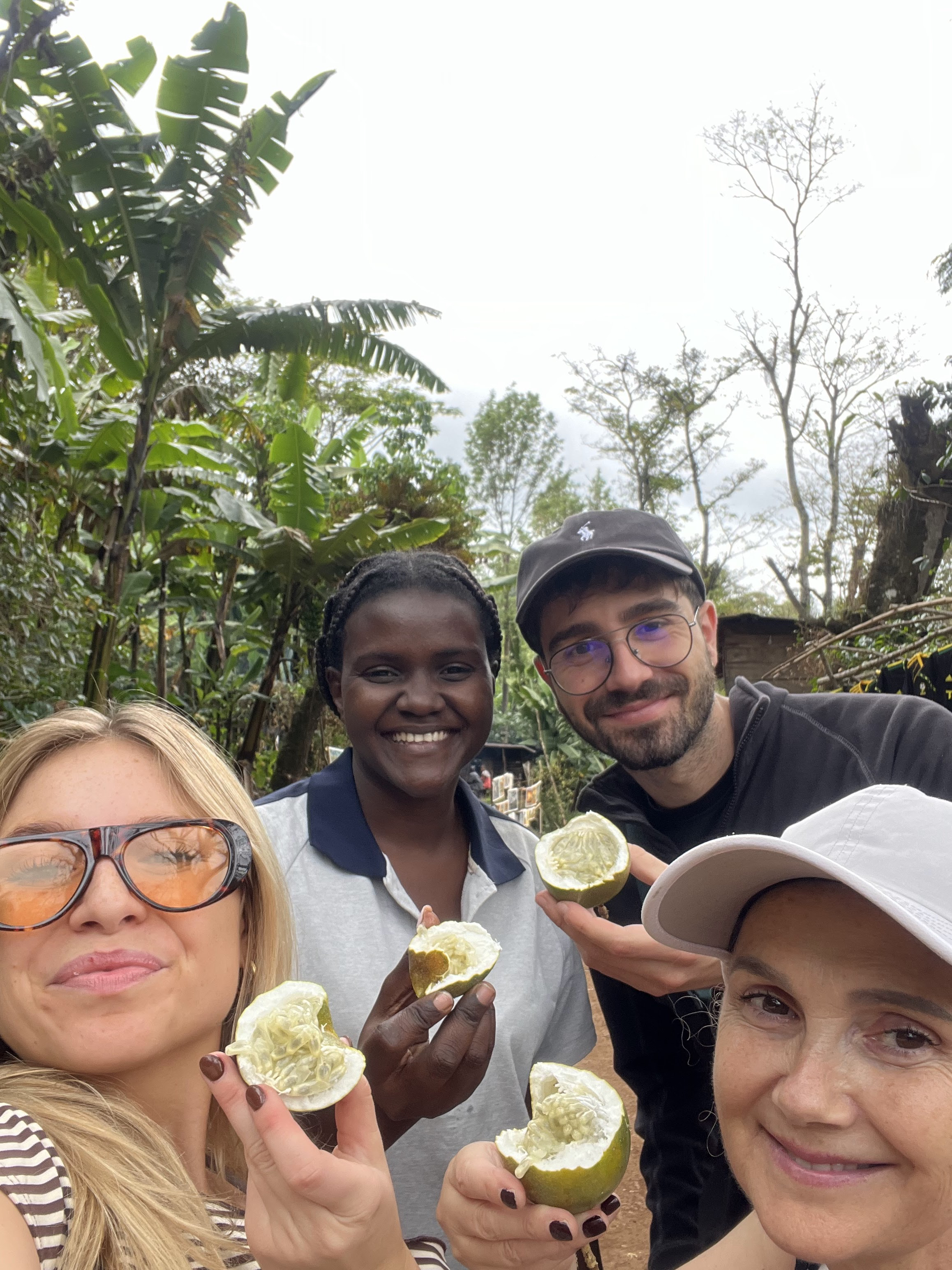 Selfie with our guide holding passion fruit